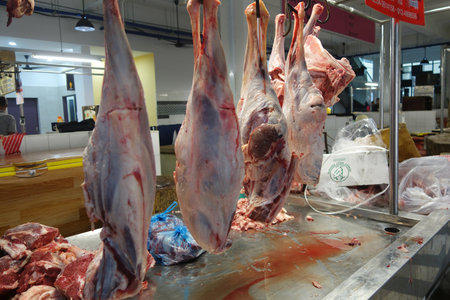 PENANG, MALAYSIA- 29 DEC, 2016: Fresh mutton hang on in the local market in Penang, Malaysiaのeditorial素材