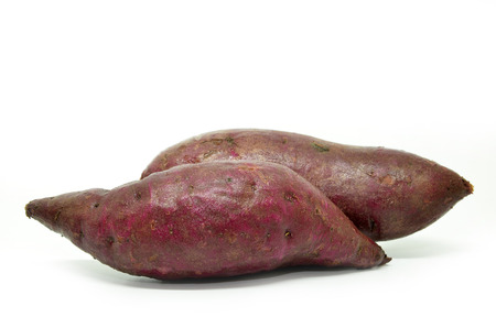Purple sweet potato isolated on white backgroundの写真素材