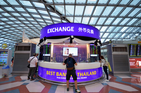 BANGKOK, THAILAND- MAY 16, 2017: An exchange currency booth at the International Airport Suvarnabhumi which is the sixth busiest airport in Asia.のeditorial素材
