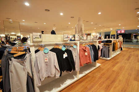 KOTA KINABALU, MALAYSIA- JUN 23, 2017: Uniqlo store located in Kota Kinabalu, Malaysia. Uniqlo Co.,...