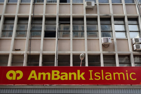 KOTA KINABALU, MALAYSIA- JUN 24, 2017: Ambank signboard on the street in Kota Kinabalu, Sabah. Ambank building is the fifth largest banking group in Malaysiaのeditorial素材