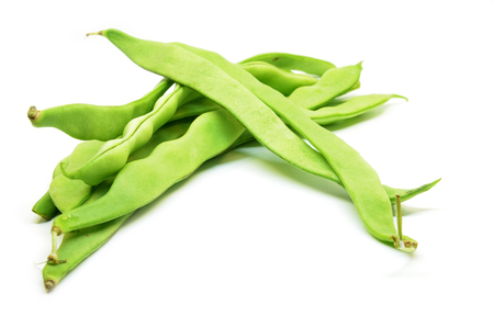 Fresh green hyacinth beans isolated on a white background.