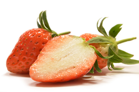 Strawberry fruits isolated on a white backgroundの写真素材