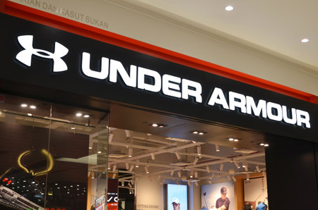 JOHOR BAHRU, MALAYSIA- FEB 18, 2018: Under Armour shop in Paradigm Mall, Johor Bahru. Under Armour, Inc. is an American sports clothing and accessories company.のeditorial素材