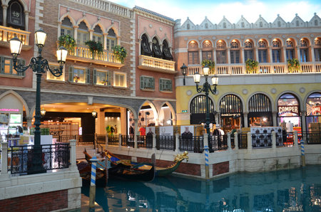 MACAU, CHINA- 07 APR, 2018: Tourist visiting the Grand Canal Shoppes Area, the largest indoor shopping mall in Macau, located in the Venetian Macau a luxury hotel and casino resort in Macau.のeditorial素材