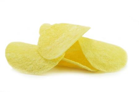 Potatoe chips isolated on pure white backgroundの写真素材