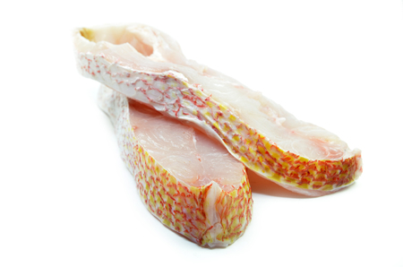 Red snapper fish fillet isolated on white background