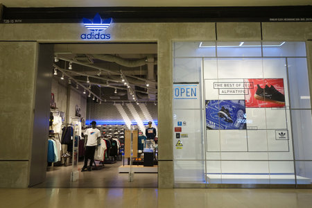 GENTING HIGHLANDS, MALAYSIA- DEC 03, 2018: The facade of the Adidas store  in Genting Highlands, Malaysia. Adidas AG is a multinational corporationのeditorial素材