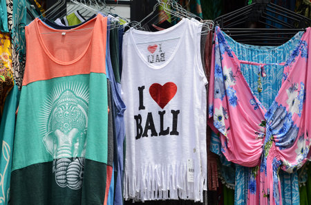 BALI, INDONESIA- 14 FEB, 2019: Souvenir shirts are for sale on at the souvenir market in Pura Tirta Empul, Bali.のeditorial素材