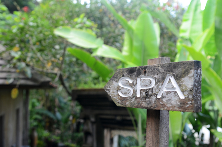 SPA arrow sign from wood on beach resortの写真素材
