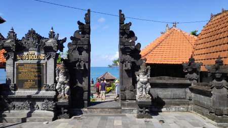 BALI, INDONESIA- 14 FEB, 2019: Tourists and local at the entrance gate in Tanah Lot Temple in Bali, Indonesia.のeditorial素材