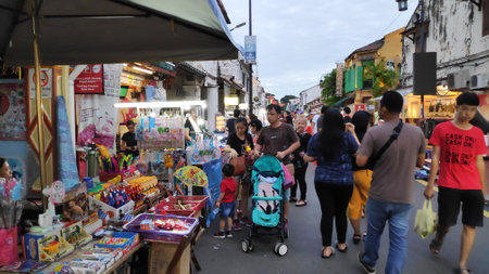 MELAKA, MALAYSIA - 25 JUN, 2019: People enjoy the local food at night market located in Jonker Street, Melaka.のeditorial素材
