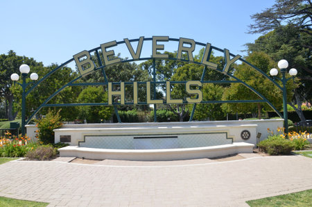 LOS ANGELES, USA- JULY 2, 2019: Beverly hills sign in Los Angeles park in Los Angeles, USA. The Beverly Hills Shield greets visitors along Santa Monica Blvd.のeditorial素材