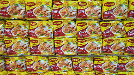 Johor Bahru, Malaysia - Aug 30, 2019 : Maggi mee instance noodles on a market shelf. This is one of Nestle product selling in supermarketsのeditorial素材