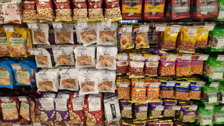 Bali, Indonesia- 18 Oct, 2019: Various nuts in packages sold at supermarket in Bali, Indonesia.のeditorial素材