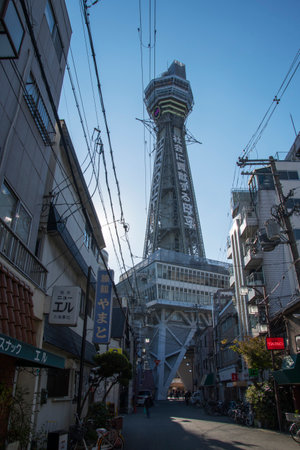 Osaka, Japan- 01 Dec, 2019: Street view of Shinsekai and Tsutenkaku tower in Osaka. Shinsekai is a retro downtown area of southern Osakaのeditorial素材