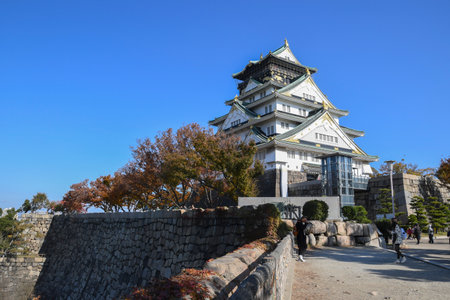 Osaka, Japan- 01 Dec, 2019: Tourist and people visit the Osaka castle in Osaka, Japan. It is the famous landmark and popular tourist destination of Osakaのeditorial素材