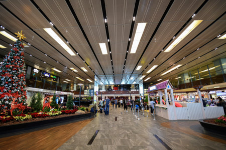 Singapore- 23 Nov, 2019: Singapore Changi Airport architecture and passengers. Changi Airport is one of the largest airports in Asia.のeditorial素材