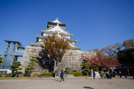Osaka, Japan- 01 Dec, 2019: Tourist and people visit the Osaka castle in Osaka, Japan. It is the famous landmark and popular tourist destination of Osakaのeditorial素材