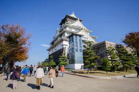Osaka, Japan- 01 Dec, 2019: Tourist and people visit the Osaka castle in Osaka, Japan. It is the famous landmark and popular tourist destination of Osakaのeditorial素材