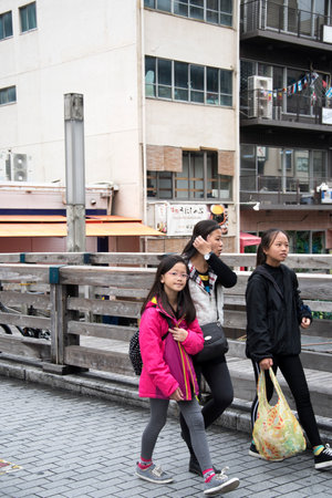 Osaka, Japan- 02 Dec, 2019: Tourist walking around pedestrian walking street at Dotonbori arcade in Namba district of Osaka, Japanのeditorial素材