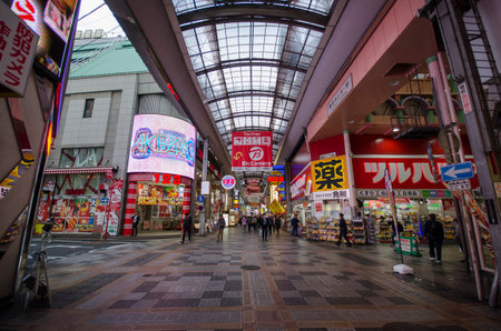 Osaka, Japan- 28 Nov, 2019: Unidentified people shop at Sennichimae Doguyasuji Shopping Arcade. Sennichimae Doguyasuji Shopping Arcade is 150m long and was built in 1970のeditorial素材