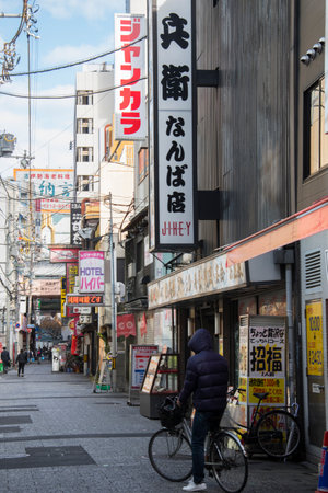 Osaka, Japan- 03 Dec, 2019: People visit Dotonbori street in Osaka, Japan. Dotonbori is the main entertainment area of Osaka.のeditorial素材