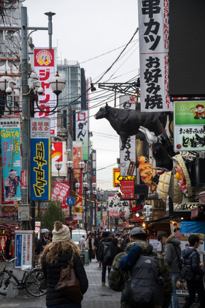 Osaka, Japan- 02 Dec, 2019: Tourist walking around pedestrian walking street at Dotonbori arcade in Namba district of Osaka, Japanのeditorial素材