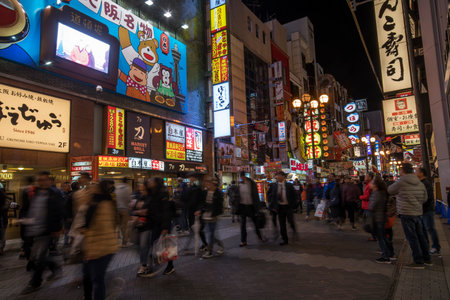 Osaka, Japan- 28 Nov, 2019: Tourist walking in Dotonbori shopping street. Dotonboti street in Namba is the best sightseeing attraction and famous place in Osakaのeditorial素材