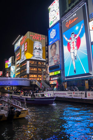 Osaka, Japan- 01 Dec, 2019: The Gulico man digital signage billboard is the popular landmark and tourist attraction in the night at Namba district, Osaka, Japanのeditorial素材