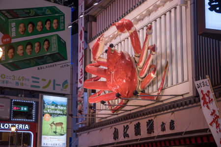Osaka, Japan- 27 Nov, 2019: Signs of Japanese restaurant on the Dotonburi walking street in king crab shaped to attract touristsのeditorial素材
