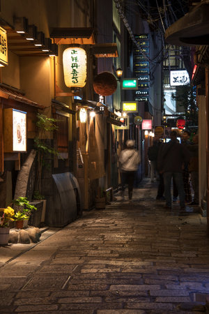 Osaka, Japan- 28 Nov, 2019: Unidentified people visit traditional restaurants in back street in Osaka downtown.のeditorial素材