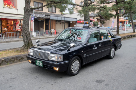 Kyoto, Japan- 25 Nov, 2019: Japanese taxi in Kyoto. Taxi is a key part of public transportation system in Japanのeditorial素材