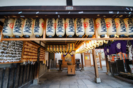 Osaka, Japan- 28 Nov, 2019: Lantern or lamp traditional lighting equipment at Hozenji Temple in Osaka, Japan. Hozenji Temple is a small but quaint temple in the warren of streetsのeditorial素材