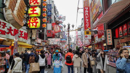 Osaka, Japan- 02 Dec, 2019: People walking in Dotonbori entertainment district. Dotonbori is one of the principal tourist destinations in Osaka Japan.のeditorial素材