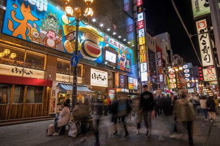 Osaka, Japan- 28 Nov, 2019: Tourist walking in Dotonbori shopping street. Dotonboti street in Namba is the best sightseeing attraction and famous place in Osakaのeditorial素材