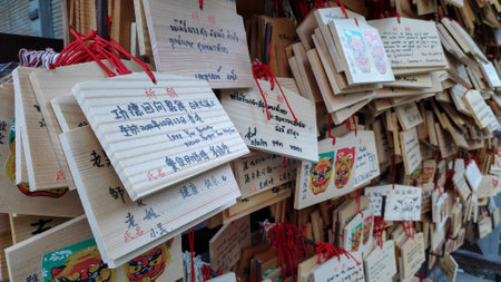 Osaka, Japan- 03 Dec, 2019: Close up wooden pray card that made from wood to use for write down something that you need or a wish at Namba Yasaka Shrine in Osaka, Japan.のeditorial素材