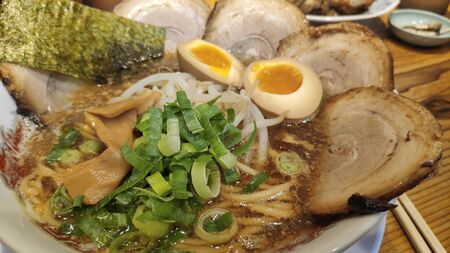 Japanese barbecued char siu pork ramen noodles in pork-bone broth