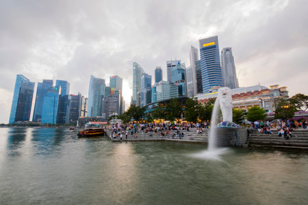 Singapore- 28 Jan, 2020: Visitors at Merlion Park in Singapore city center. Merlion is a famous landmark in Singapore and popular for tourists.のeditorial素材