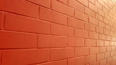 Tiled red brick wall of a building