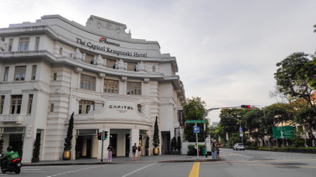 Singapore, 08 Nov, 2020: The white building with corner entrance to the Capitol Kempinski Hotel at the Downtown Core in Singapore.のeditorial素材