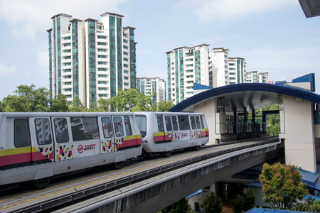 Singapore- 14 Nov, 2020: Self Driving Light Rapid Transit LRT on elevated tracks in Singapore. LRT is a localised automated guideway transit systems acting as feeder services to Mass Rapid Transit.のeditorial素材