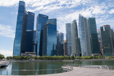 Singapore- 11 Oct, 2021: Beautiful Singapore city skyline of business district downtown over a blue...