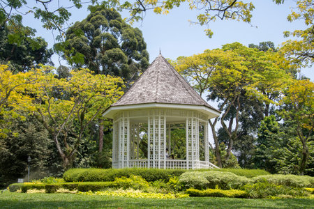 Singapore- 16 Oct, 2021: Gazebo or white bandstand at Singapore Botanic Gardens. he octagonal gazebo known as the Bandstand was erected in 1930 and has retained its original shapeのeditorial素材