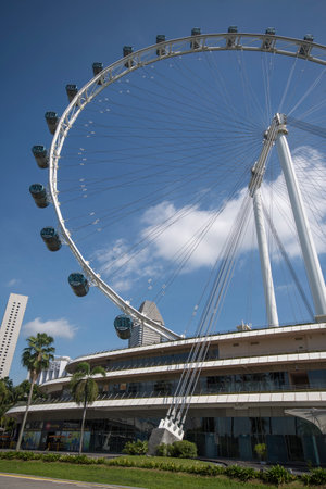 Singapore- Mar 13, 2022: Singapore flyer ferris wheel in Singapore. Singapore Flyer is the largest Giant Observation Wheel and consist of 28 capsules.のeditorial素材