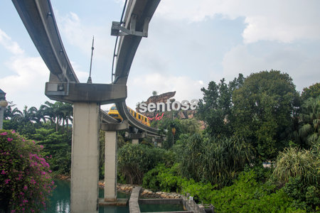 Singapore- Apr 2, 2022: Sentosa Island sign with the monorial pass through.のeditorial素材