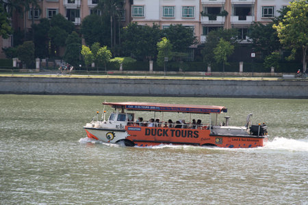 Singapore- Mar 19, 2022: Singapore DUCK Tour bus sail on the water. This hour-long journey brings you up close to Singapore's famous landmarks.のeditorial素材
