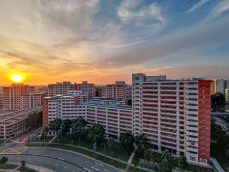 Singapore- Apr 12, 2022: Residential apartment and housing blocks (HDB) estate during sunset in Singaporeのeditorial素材