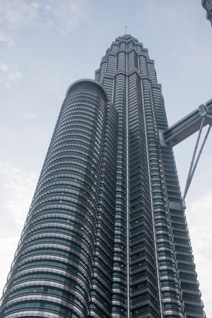 Kuala Lumpur, Malaysia- Apr 17, 2022: The landmark Petronas Twin Towers and KLCC Twin Towers in the...