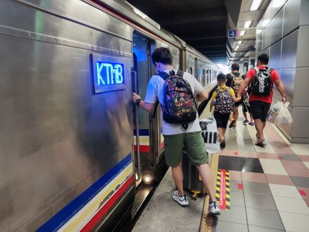 Johor Bahru, Malaysia, Oct 8, 2022. People taking the KTM train to JB from Singapore. It only takes 5-minute to reach the destination.のeditorial素材